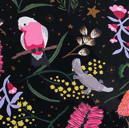 Wattle and Rose pattern featuring native animals on a black background amongst Australian flowers
